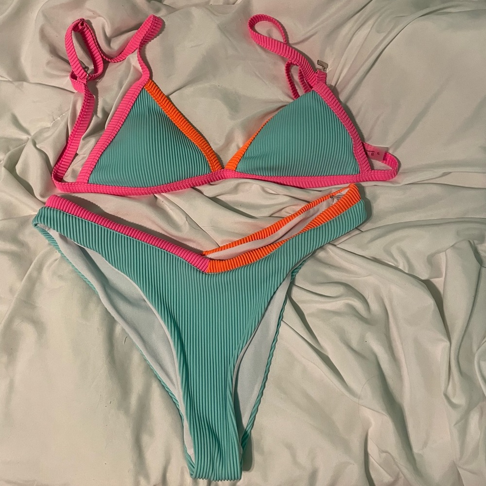 Never worn adorable triangle top and bottom